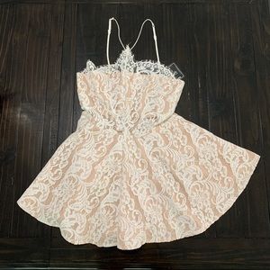 Short creme romper.